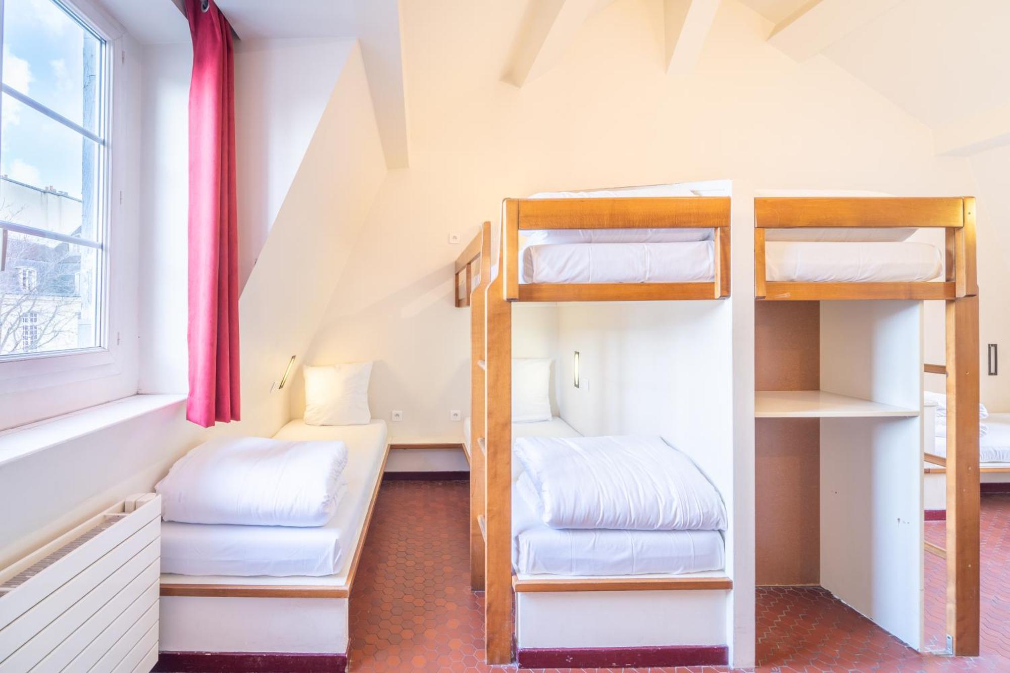Mije Marais Hostel باريس المظهر الخارجي الصورة A typical room at a hostel