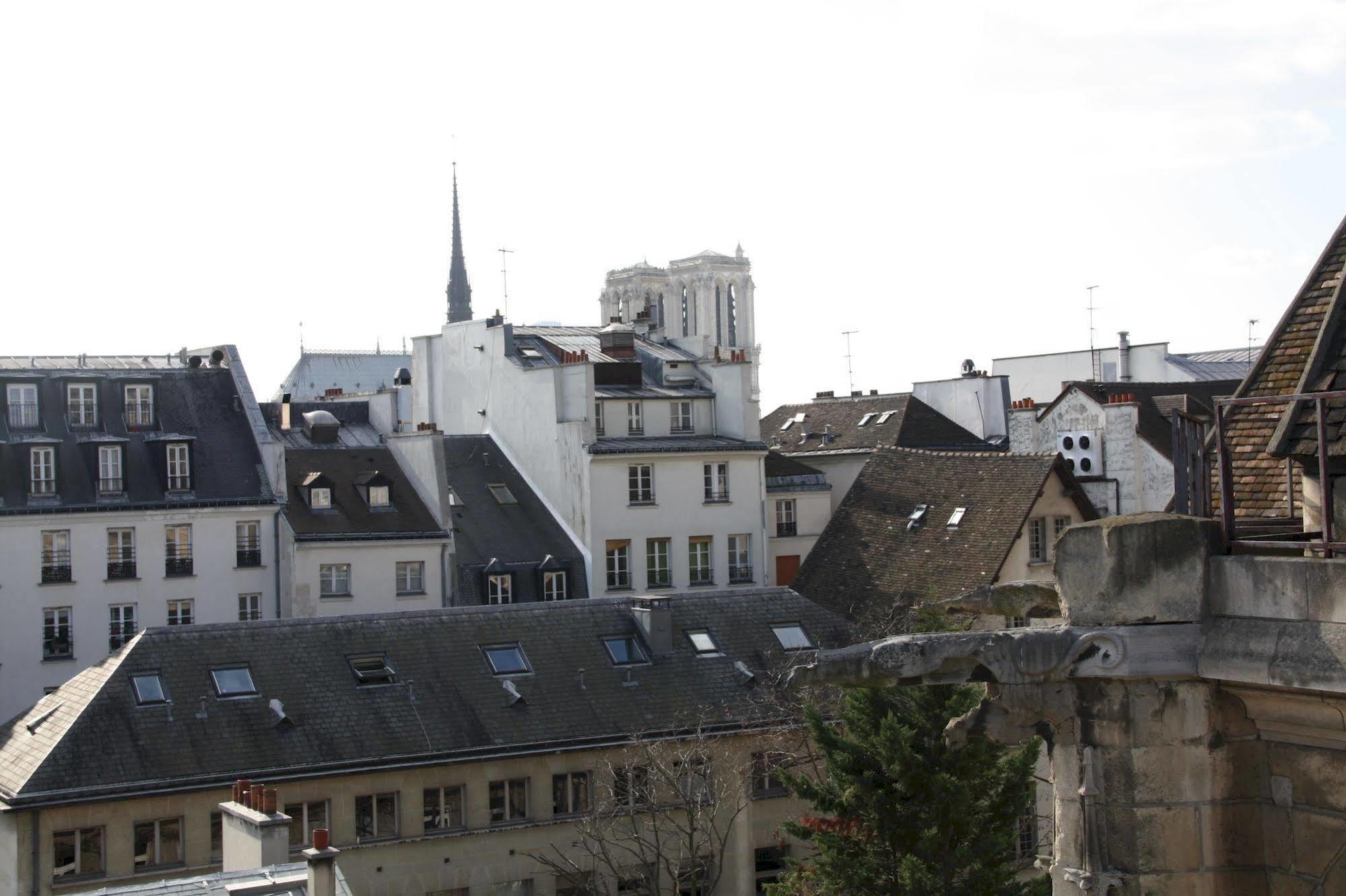Mije Marais Hostel باريس المظهر الخارجي الصورة The roofs of Paris