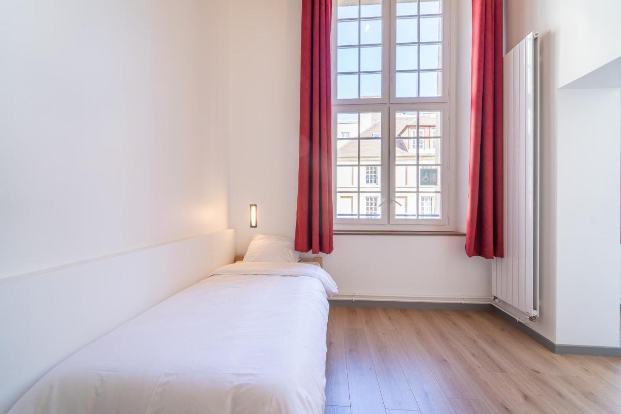 Mije Marais Hostel باريس المظهر الخارجي الصورة A typical room at the hotel
