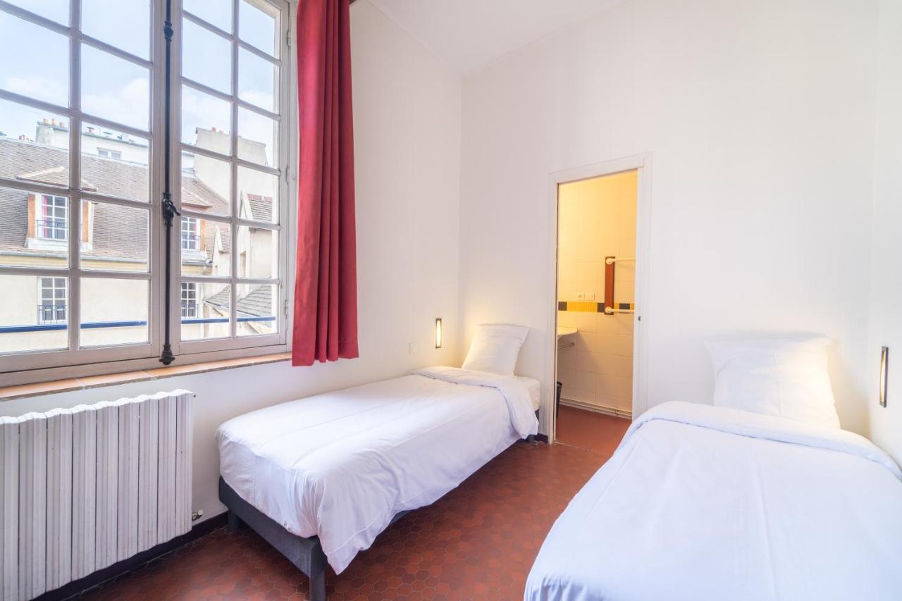Mije Marais Hostel باريس المظهر الخارجي الصورة A typical room at the hostel