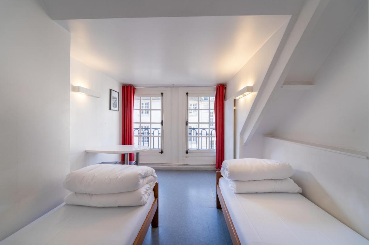Mije Marais Hostel باريس المظهر الخارجي الصورة A typical room at the hotel